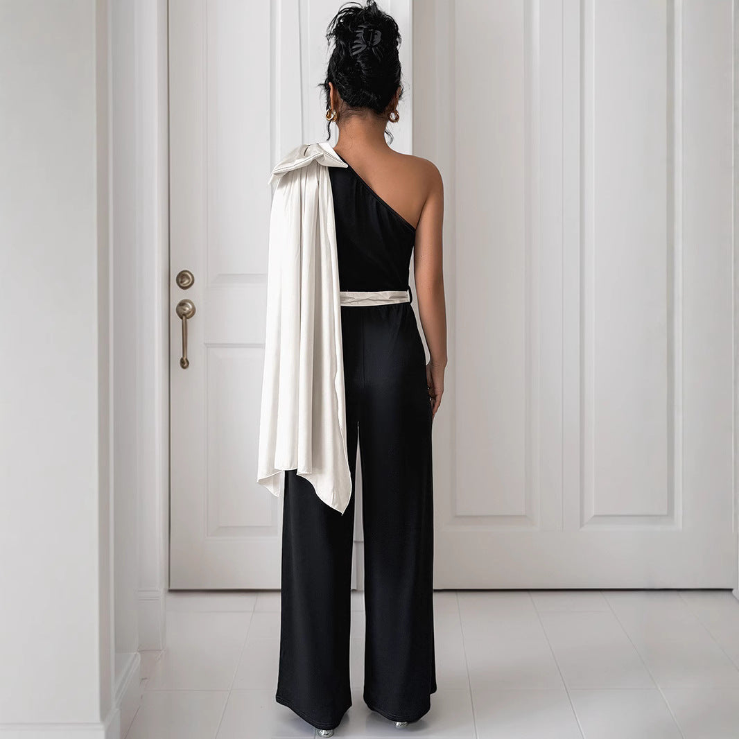 Dam Jumpsuit – Figursydd Passform – Satäng Finish – Enaxlad Rosettdetalj